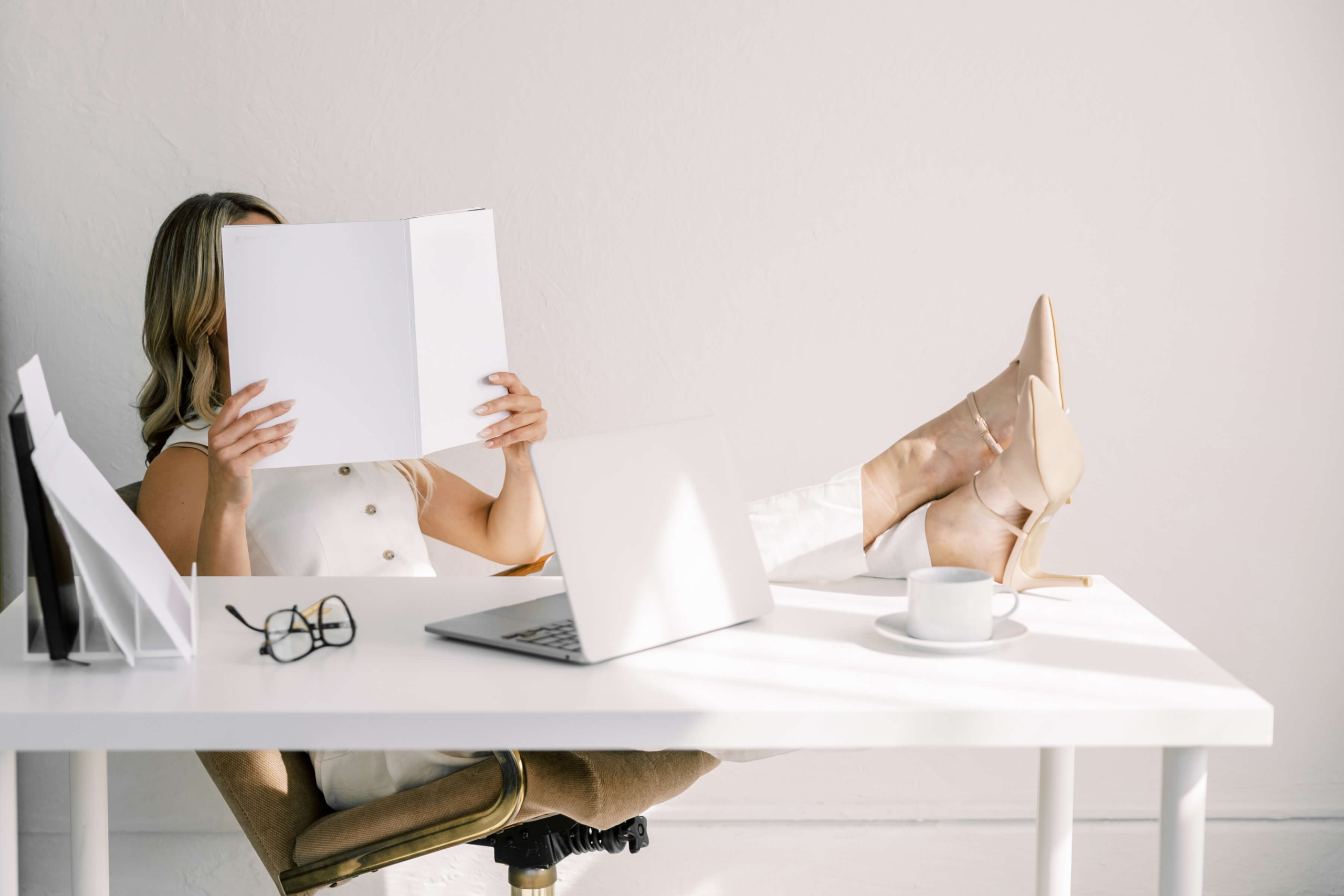 person at desk reading report